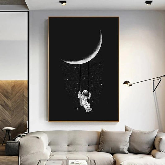 Moon Swinging Astronaut Canvas Print